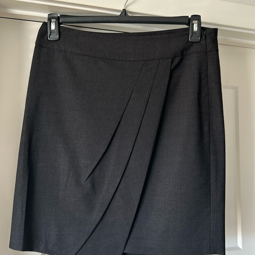 Charcoal colored skirt pleaded